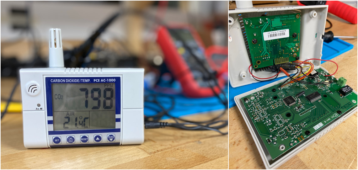 Digitales CO₂-Messgerät auf einer Werkbank. Das Display zeigt einen CO₂-Wert von 758 ppm und eine Temperatur von 21,4 Grad Celsius. Im Hintergrund sind unscharf verschiedene Messgeräte und Kabel zu sehen. Rechts daneben ist das geöffnete Gerät sichtbar.